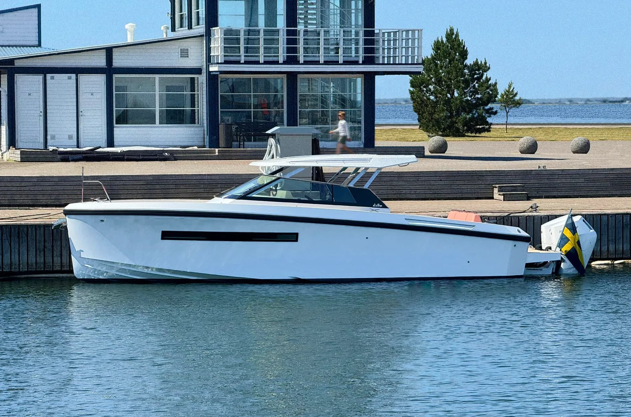 Boat in the water + mountains